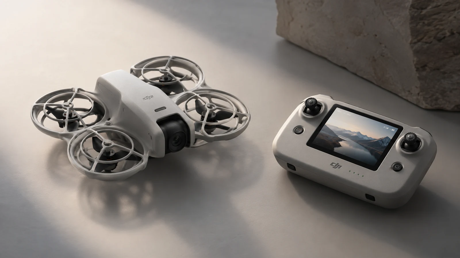 Compact guarded mini drone with a small built-in-screen controller