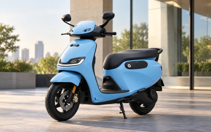 Polar blue electric scooter parked outside a modern building in a clean urban environment.